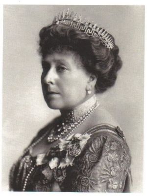 Princess Beatrice wearing Queen Victoria Sunray tiara atop a Greek key-type tiara.jpg